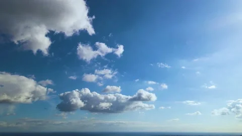 Camera pan of fluffy clouds Stock Footage 207734918