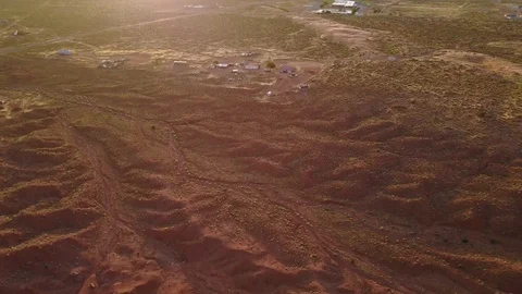 Camera pan up flying into sunrise in Monument Valley Stock Footage 89021270