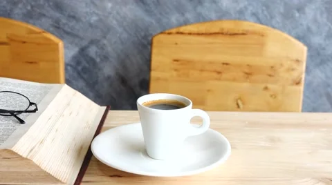 Camera pan footage coffee on table Video stock 67612042