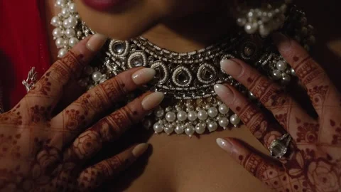 Camera pan over beautiful Gold necklace pakistani bridal getting ready her Stock Footage 307208311