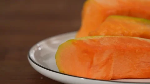 Camera pan of pumpkins on plate Stock Footage 183493947