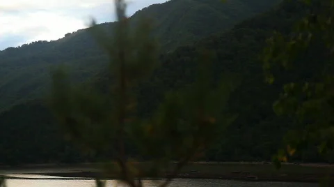 Camera pan river and mountain landscape Stock Footage 864610