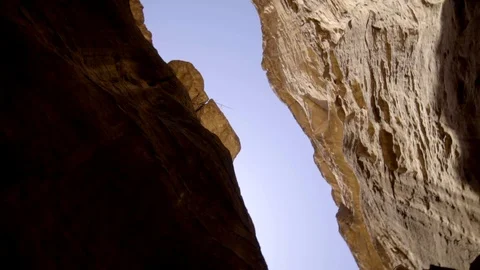 Camera pan to the sky and move in a circle in a canyon Stock Footage 103522200