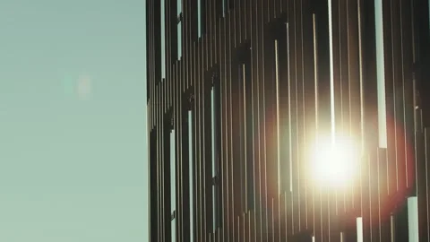 Camera Pan Up Skyscraper with Sunbeam Stock Footage 316918228