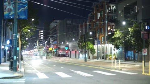 Camera pan of tram lines in Dogpatch neighbourhood at night, San Francisco, USA Stock Footage 233468950
