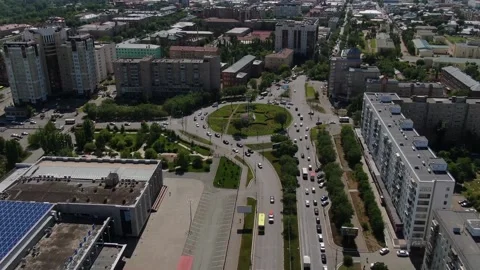 Camera panarama from top to bottom on the road along which cars drive, top view 動画素材 146309478