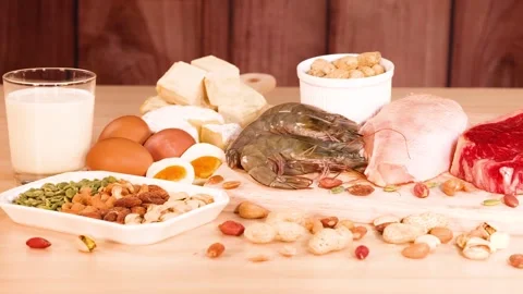 Camera panning across assorted high protein food sources including meat sea.. Stock Footage 333489907