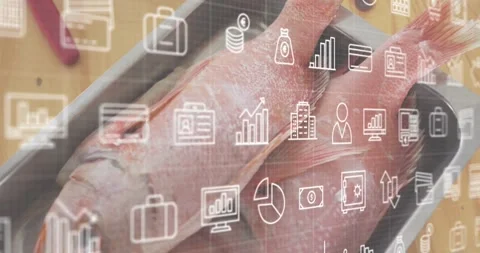 Camera panning downward revealing red fish bodies in tray under financial icons Stock Footage 317773419