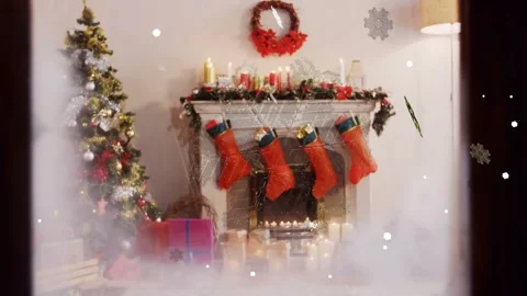Camera panning, frost lifting on window, mantel revealing stockings and lit Stock Footage 339494769