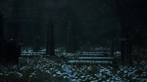 Camera is panning in an old spooky graveyard with morning mist and church in the Stock Footage 236408710