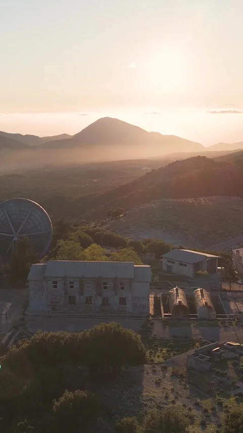 Camera panning over abandoned observatory at sunset Video stock 290449851