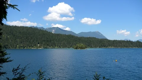 Camera panning over the Eibsee in summer Stock Footage 120653215