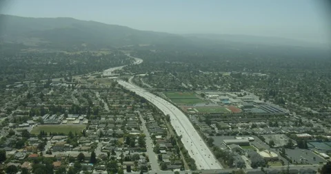 Camera panning over highway, helicopter aerial, day Video stock 115051301