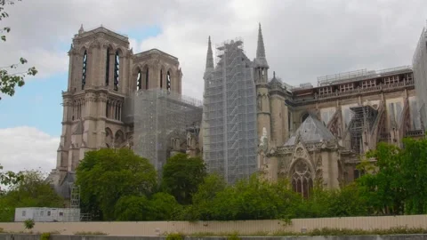 Camera panning over Notre-Dame de Paris after its reconstruction post the Stock Footage 161773306