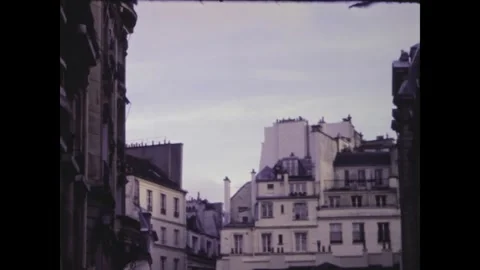 Camera panning over parisian rooftops showing residential buildings Stock Footage 291065038