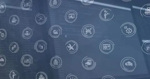 Camera panning revealing monitors scrolling code behind floating tech icons for Stock Footage 317119392