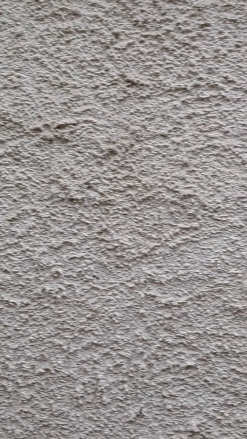 Camera Panning Right Across Rough Gray Stucco Wall Texture Stock Footage 332012933