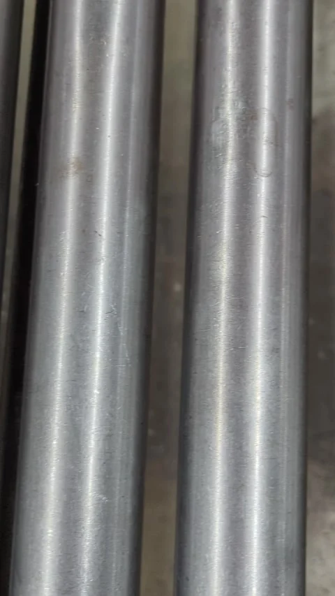 Camera Panning Right Over Rows of Industrial Metal Pipes Stock Footage 332013007