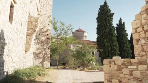 Camera panning right revealing ancient monastery Video stock 289663350