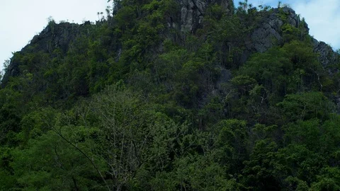Camera panning up to the rock mountain in 4K Stock Footage 109082924