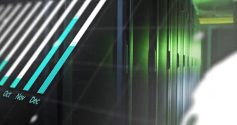 Camera panning server rack corridor, fading bar chart animating monthly bars for Stock Footage 309721976