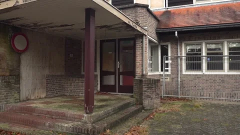 Camera panning showing deserted building exterior Video stock 292924541