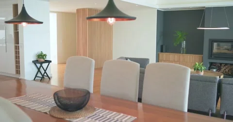 Camera panning slowly, showing table and chairs sliding aside to showcase Stock Footage 338061463