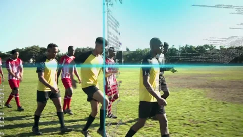 Camera panning as two soccer teams walking to goal player dribbling ball cyan Stock Footage 333287323