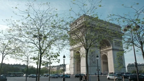 Camera Panoramic Pan Right Thru Sidewalk Trees Arc De Triomphe Angled View Paris Stock Footage 93239037