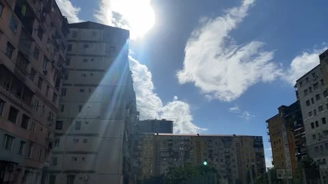 Camera pans across aging apartment blocks in Batumi, Georgia, revealing Stock Footage 347586270