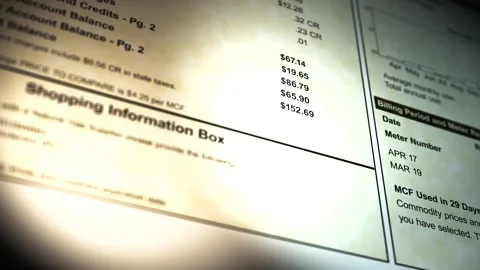 Camera pans across a Generic Gas Bill 2 Stock Footage 307731361
