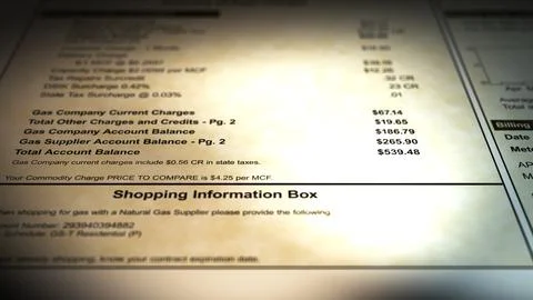 Camera pans across a Generic Gas Bill - Large Bill 00015 Stock Photos
