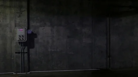 Camera pans across the ground level of an empty parking garage to elevator in th Stockbeeldmateriaal 83367634