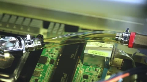 Camera Pans Across Liquid Cooled Motherboard From Processor To M2 SSD Stock Footage 340331565
