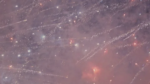Camera pans across many fireworks exploding in a long take 動画素材 115926096