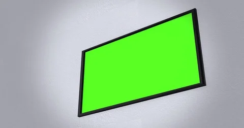 Camera pans across modern flatscreen 4K UHD TV on wall ALT Stock Footage 81759085