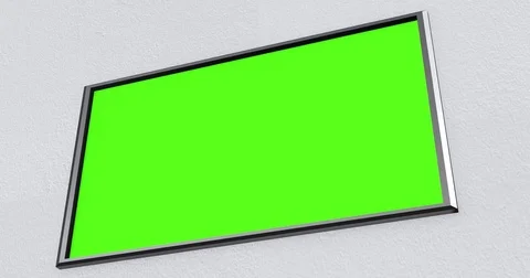 Camera pans across modern flatscreen 4K UHD TV on wall Stock Footage 81863437