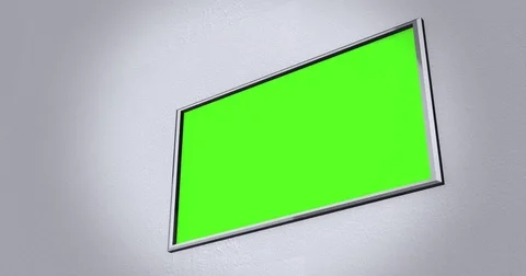 Camera pans across modern flatscreen 4K UHD TV on wall ALT Stock Footage 81863503