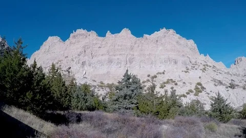 Camera pans across rock formations in the Badlands Stock Footage 81764013
