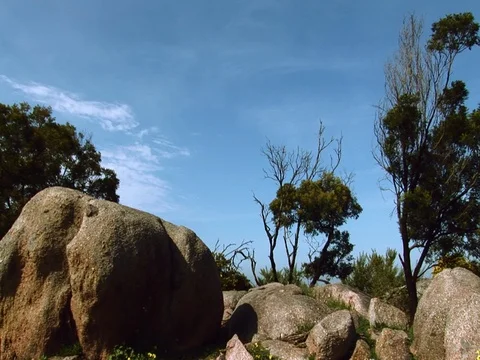 Camera pans across a rocky mountain. Stock Footage 80242977