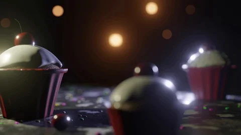 Camera pans across table covered in flour and sprinkles and cupcakes. 스톡 동영상 101400534