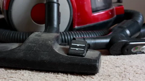 Camera Pans Across Vacuum Cleaner Head On Carpet 스톡 동영상 318426710