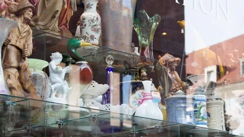 Camera Pans Antique Shop Window Display in Nuremberg Stock Footage 321793048