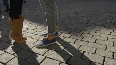 Camera pans around couple as they kiss while in the city. Stock Footage 63020716