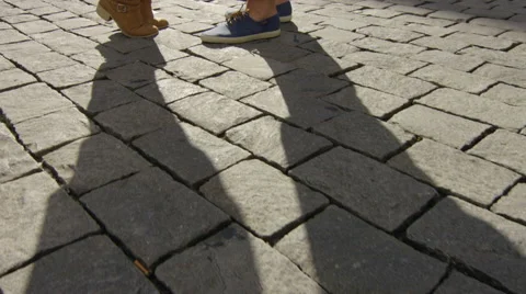 Camera pans around couple as they kiss while in the city. Video stock 63025221