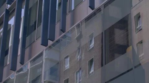 Camera pans up a commercial building Stock Footage 165291741
