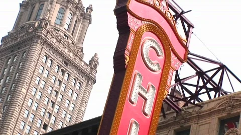 The camera pans down the Chicago Theater's colorful marquee. Stock Footage 437575
