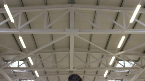 Camera pans down to show factory worker using a tablet for work. Stock Footage 63027206