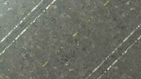 The camera pans the highway diagonally from left to right. Gray concrete and Stock Footage 148383587