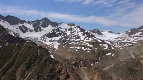 Camera Pans From Left To Right Revealing A Majestic Mountain Range With Snow-Cap 스톡 동영상 315785677